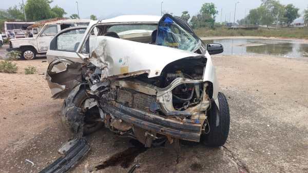 Luxury car laden with liquor crashes